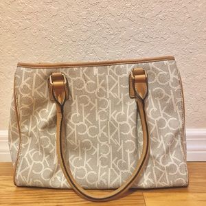 Great condition!! Cream and Tan Calvin Klein Purse